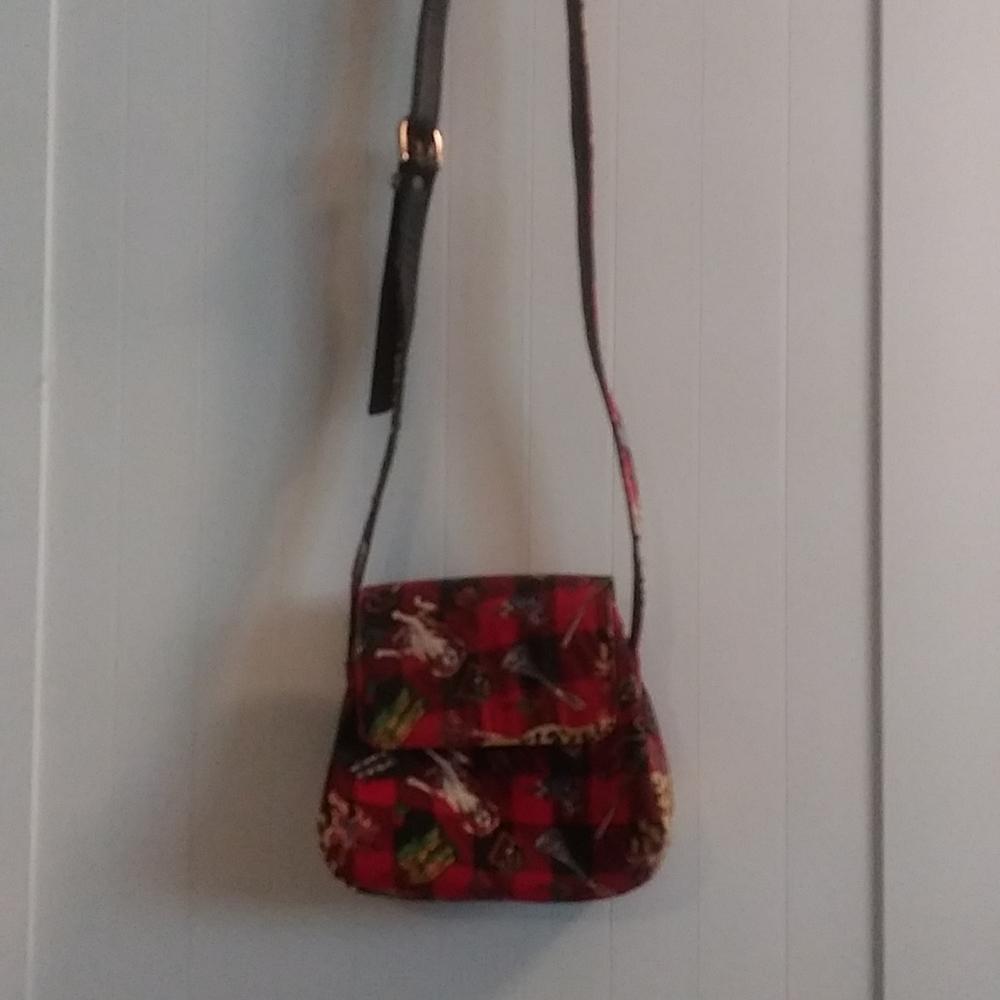 A plaid purse with an unusual print